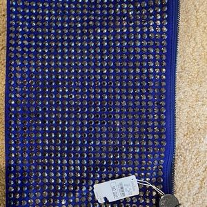 Neiman Marcus laptop/tablet sleeve.